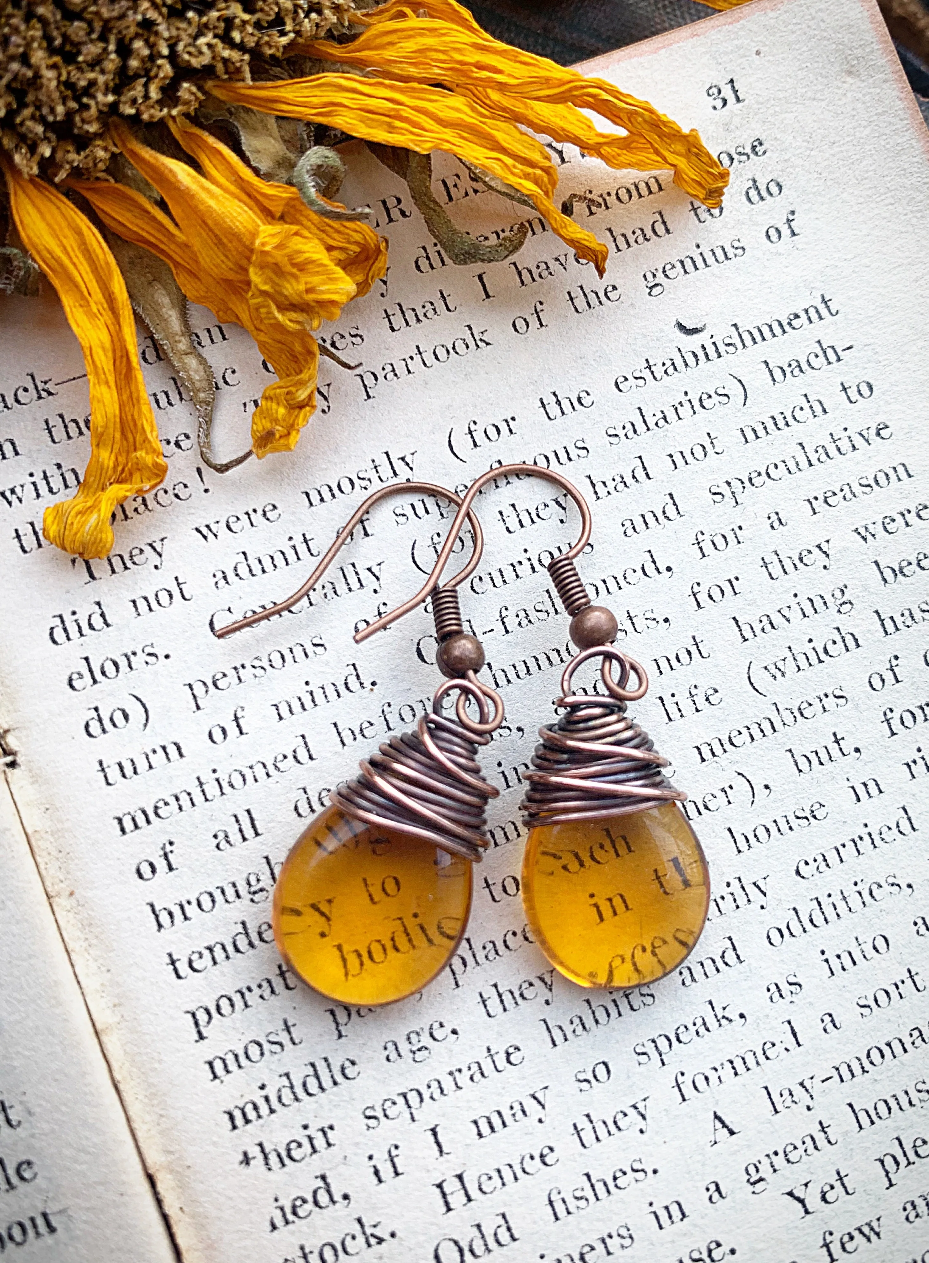 Amber teardrop Czech glass and copper wire wrapped earrings.