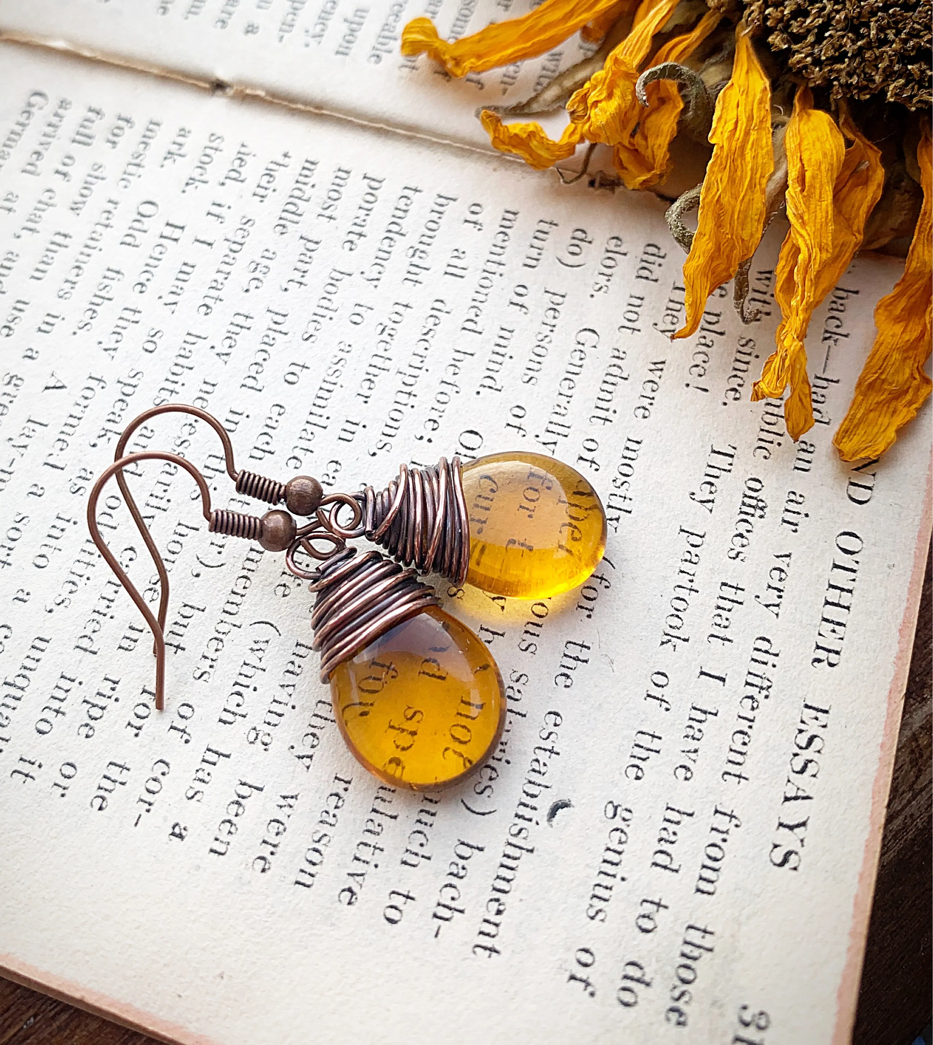 Amber teardrop Czech glass and copper wire wrapped earrings.